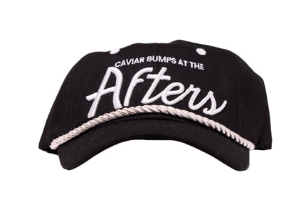 Black dad hat with white text script on a white background.  Text reads Caviar Bumps at the Afters