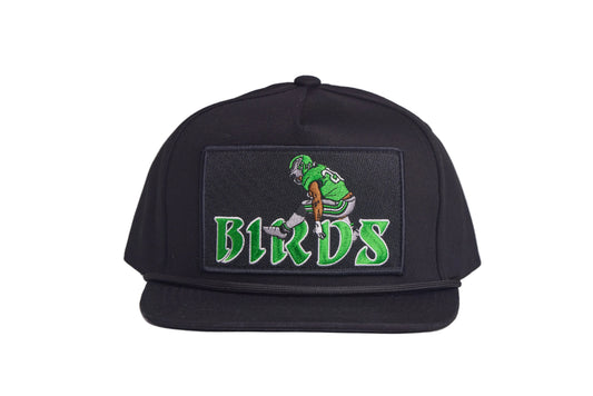 Black hat featuring Saquon Barkley in his iconic backwards hurdle