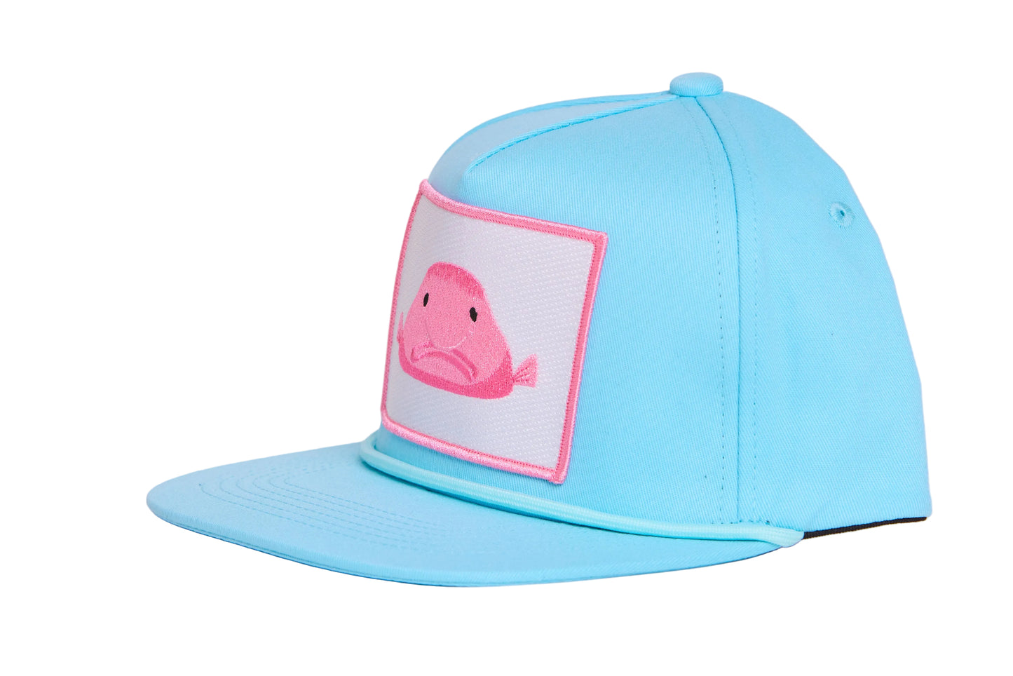 Baby blue flat-bill hat with a pink blobfish patch