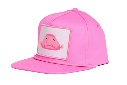 Light pink flat-bill hat with a pink blobfish patch