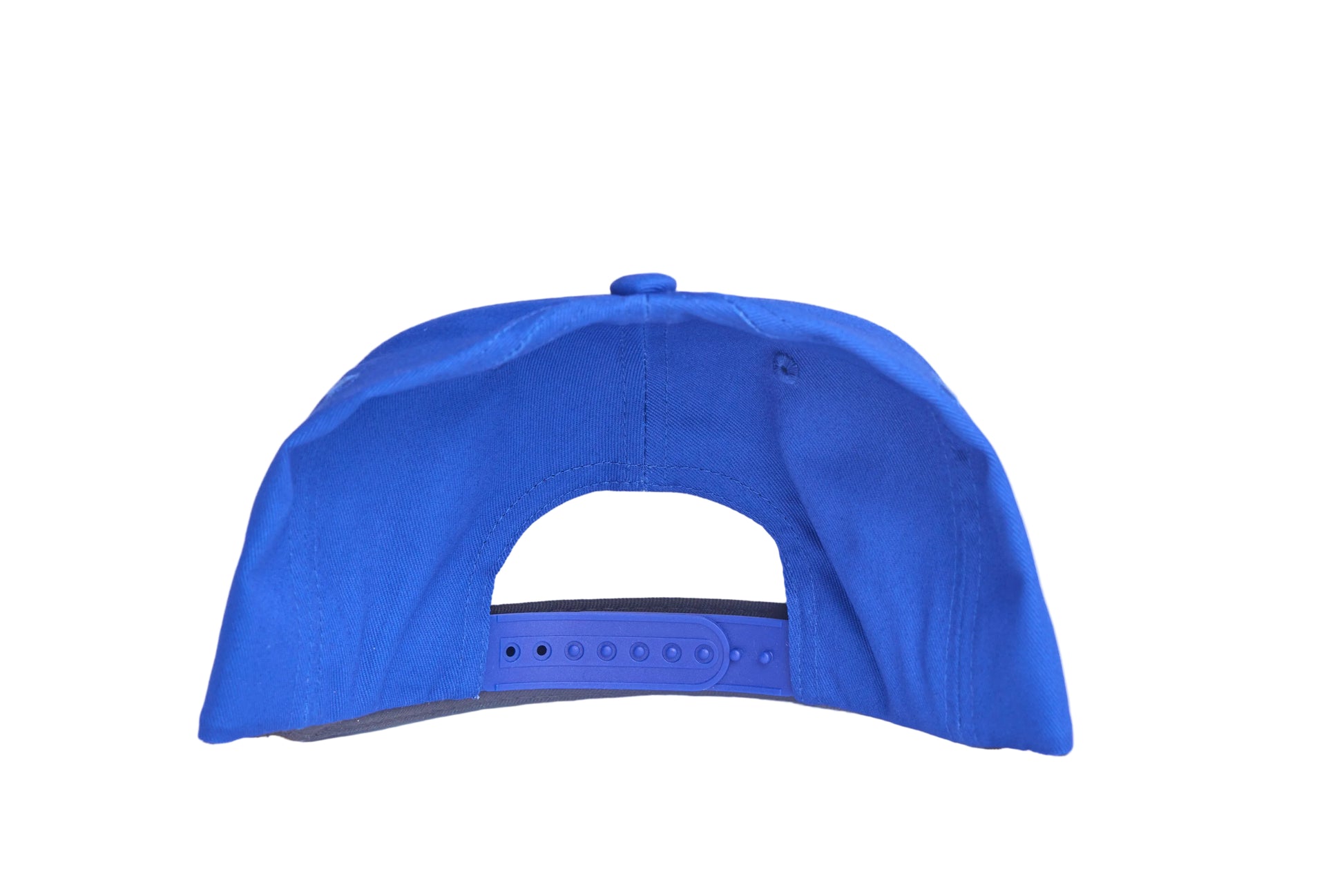 Blue flat-bill hat with embroidered blue whale design and a breaking wave design on the underside of the bill