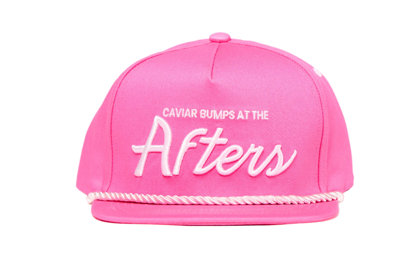 Pink flat brim hat with 90s script that readys Caviar Bumps at the afters