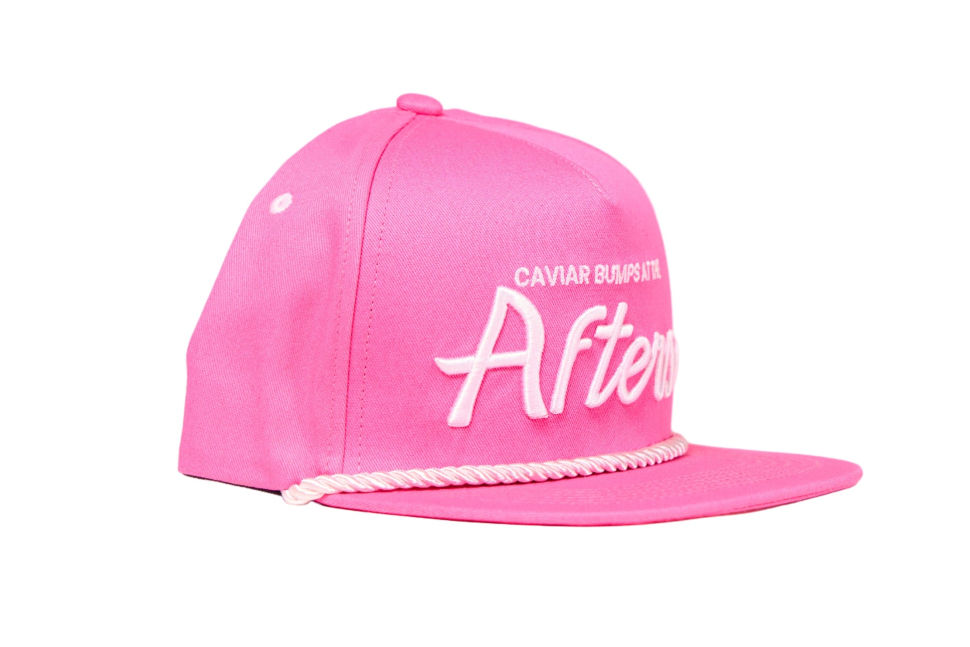 Pink flat brim hat with 90s script that readys Caviar Bumps at the afters