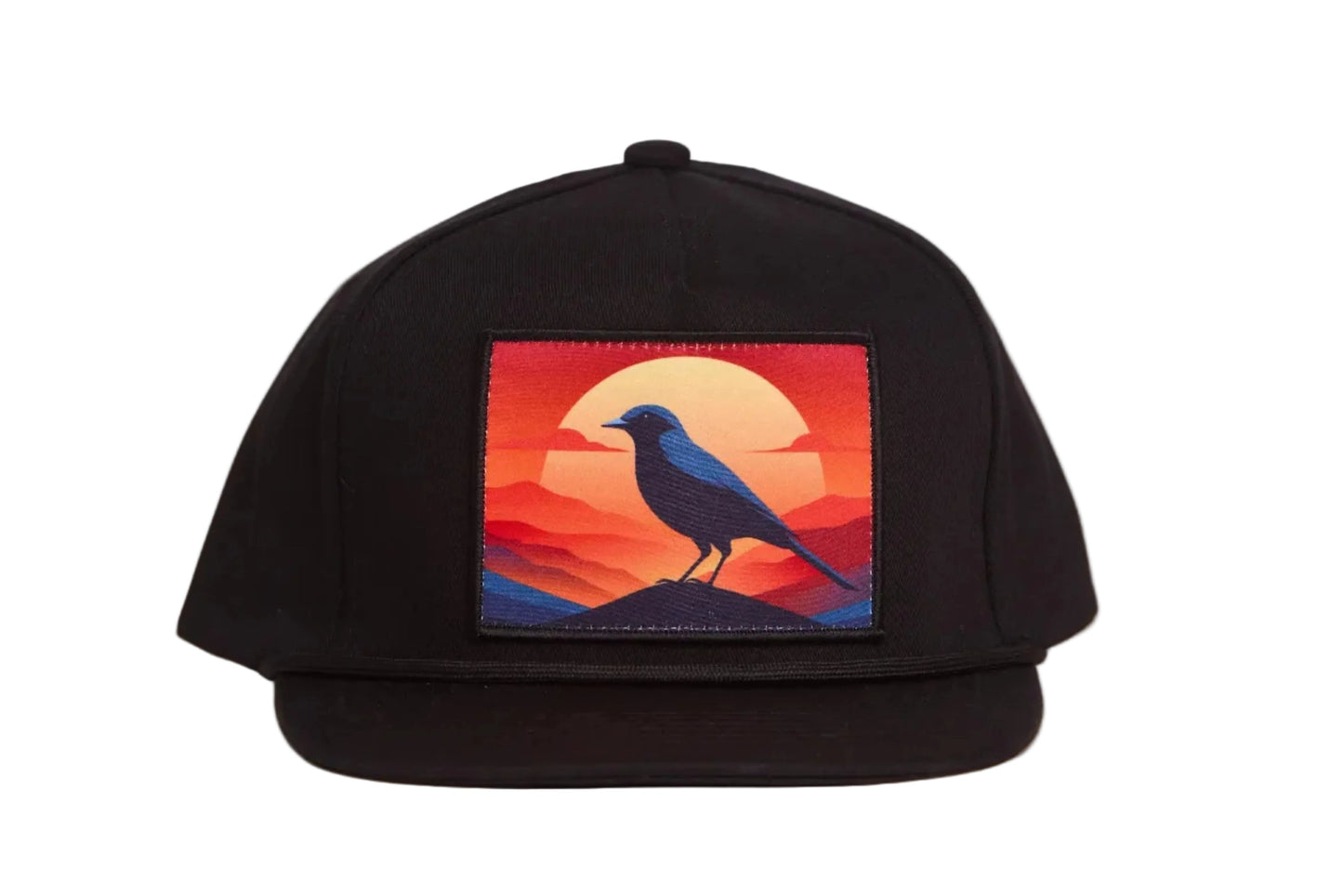 Black hat with a patch of a crow at sunset