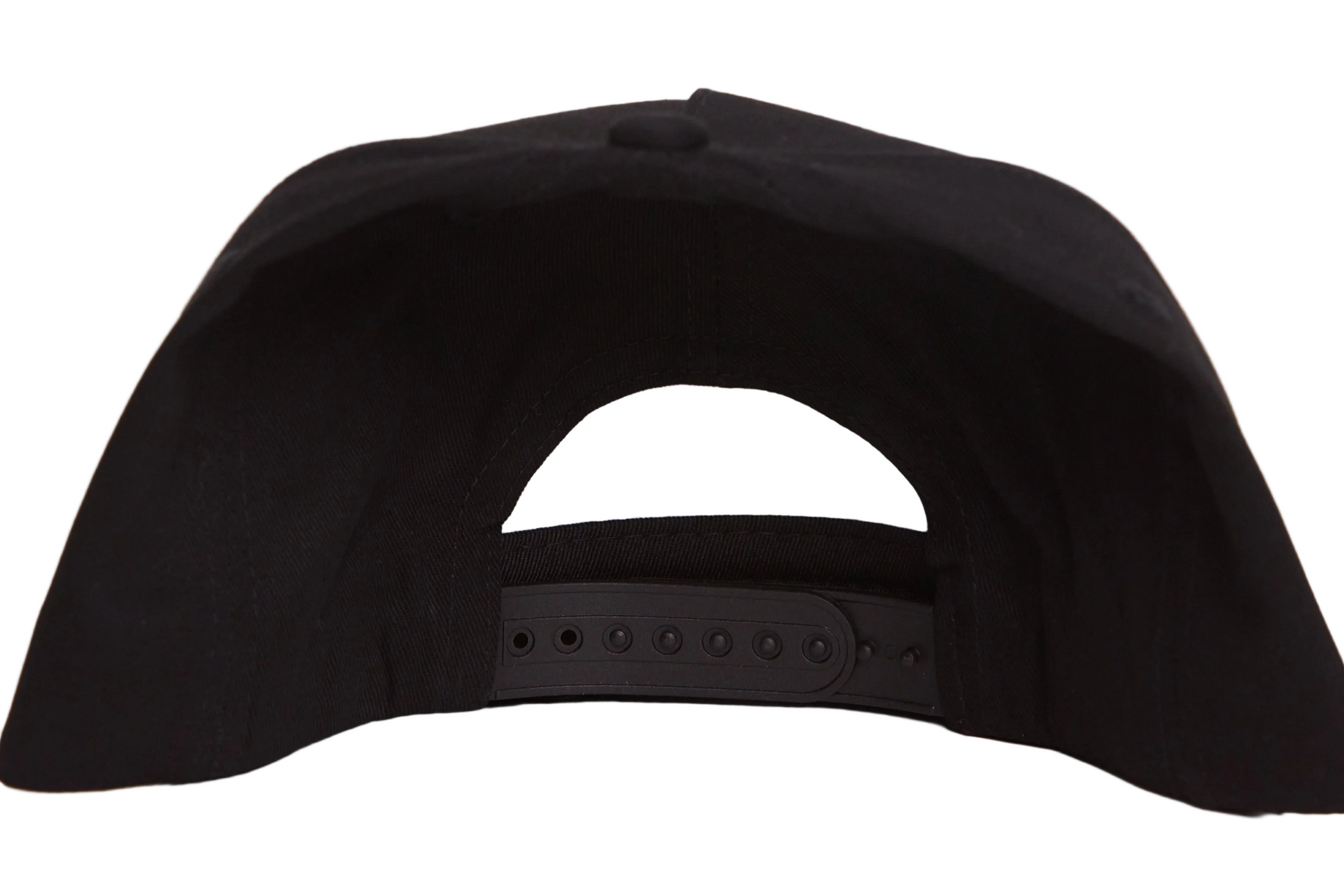 Black hat with a patch of a crow at sunset