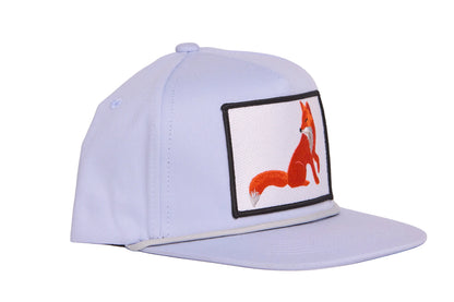 Grey hat with a regal fox in profile, looking back over it's shoulder