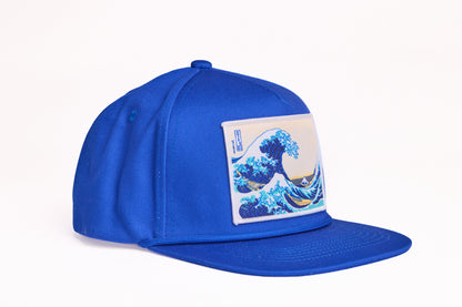 Blue cap featuring Hokusai's iconic painting of The Great Wave off Kanagawa from the series 36 views of Mt. Fuji