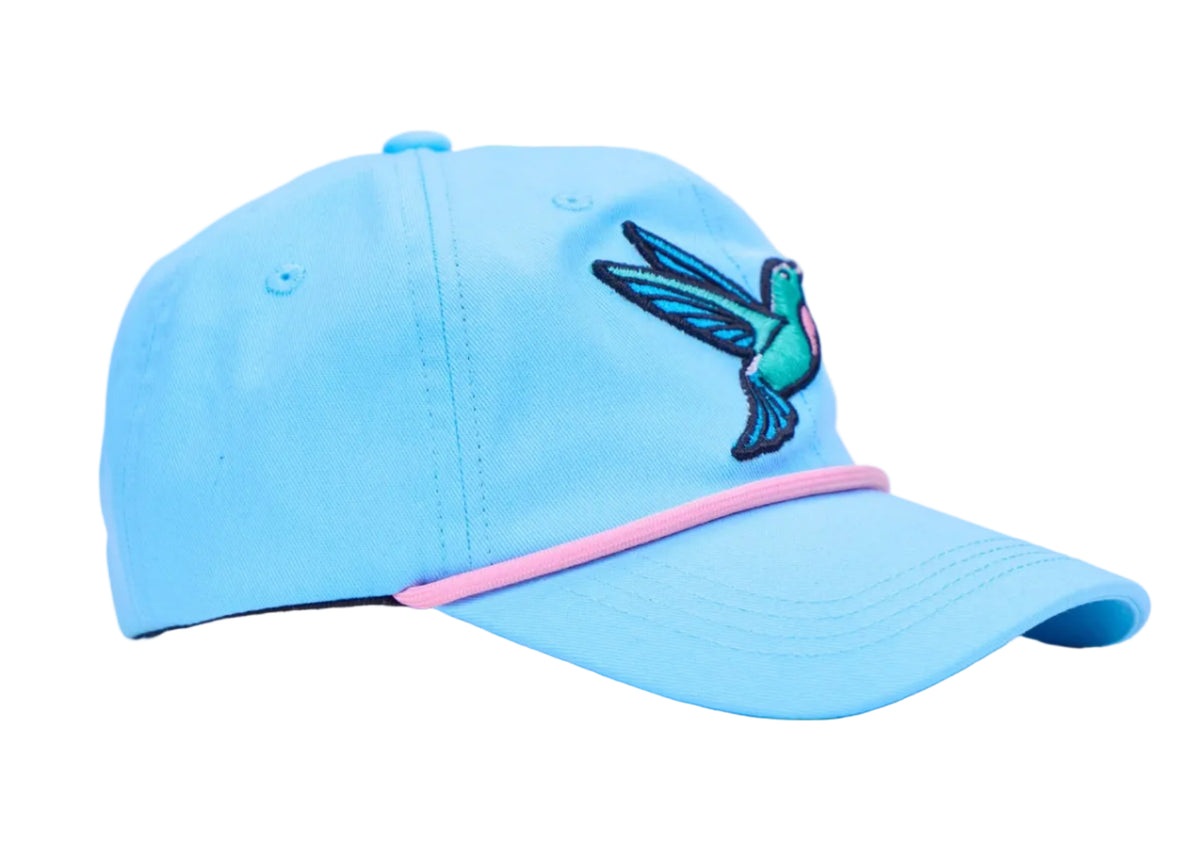 A light blue baseball cap featuring a pink trim along the edge of the brim and an embroidered hummingbird on the side, set against a plain white background.
