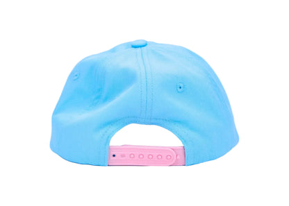 The back of a light blue baseball cap with a pink plastic snapback closure, shown on a clean white background.