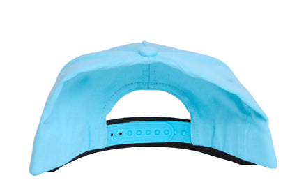 Turquoise blue hat with a patch of a hummingbird and flowers