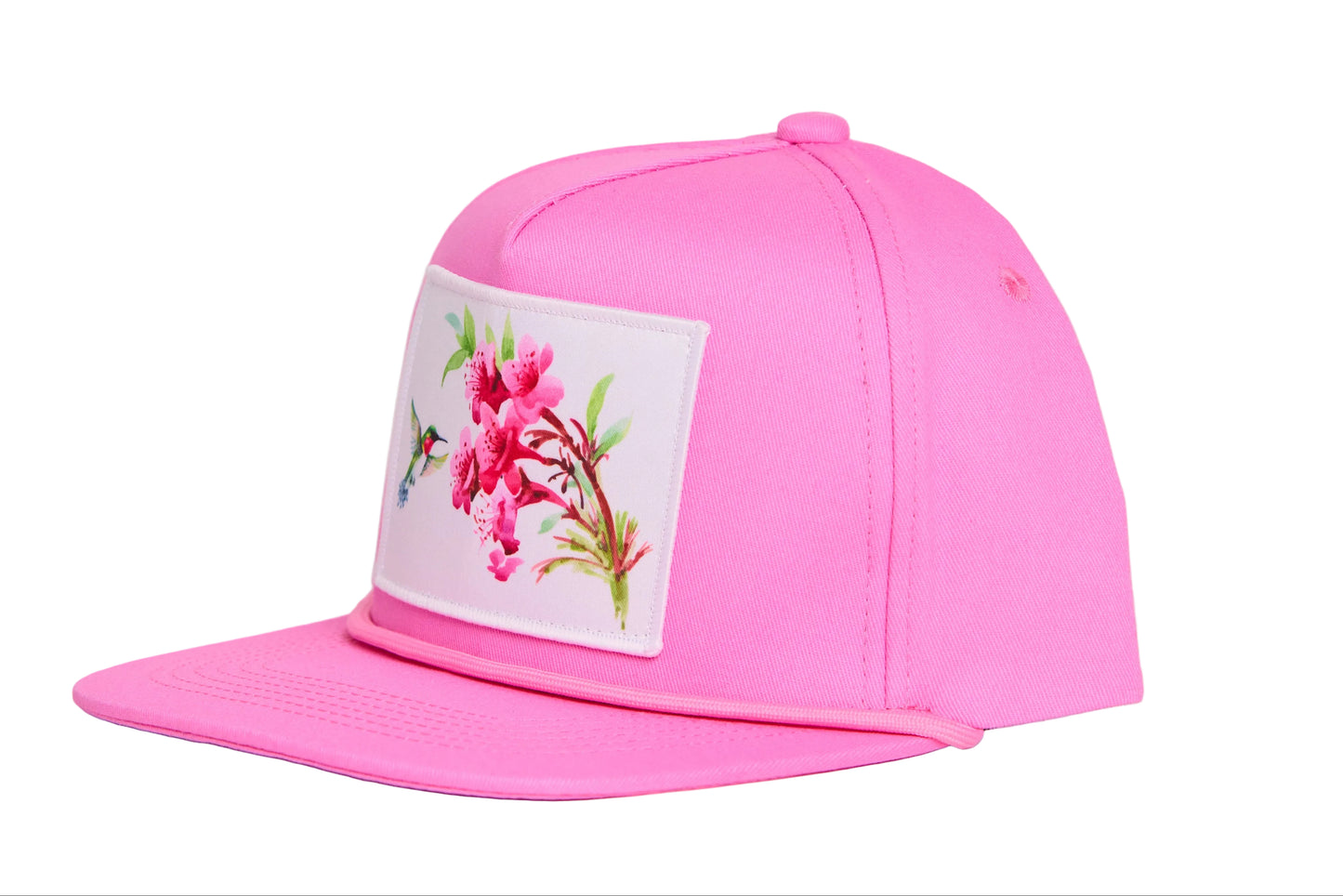Pink hat with a patch of a hummingbird and flowers