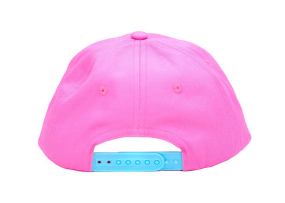 A bright pink baseball cap shown from the back, featuring a light blue plastic snapback closure 