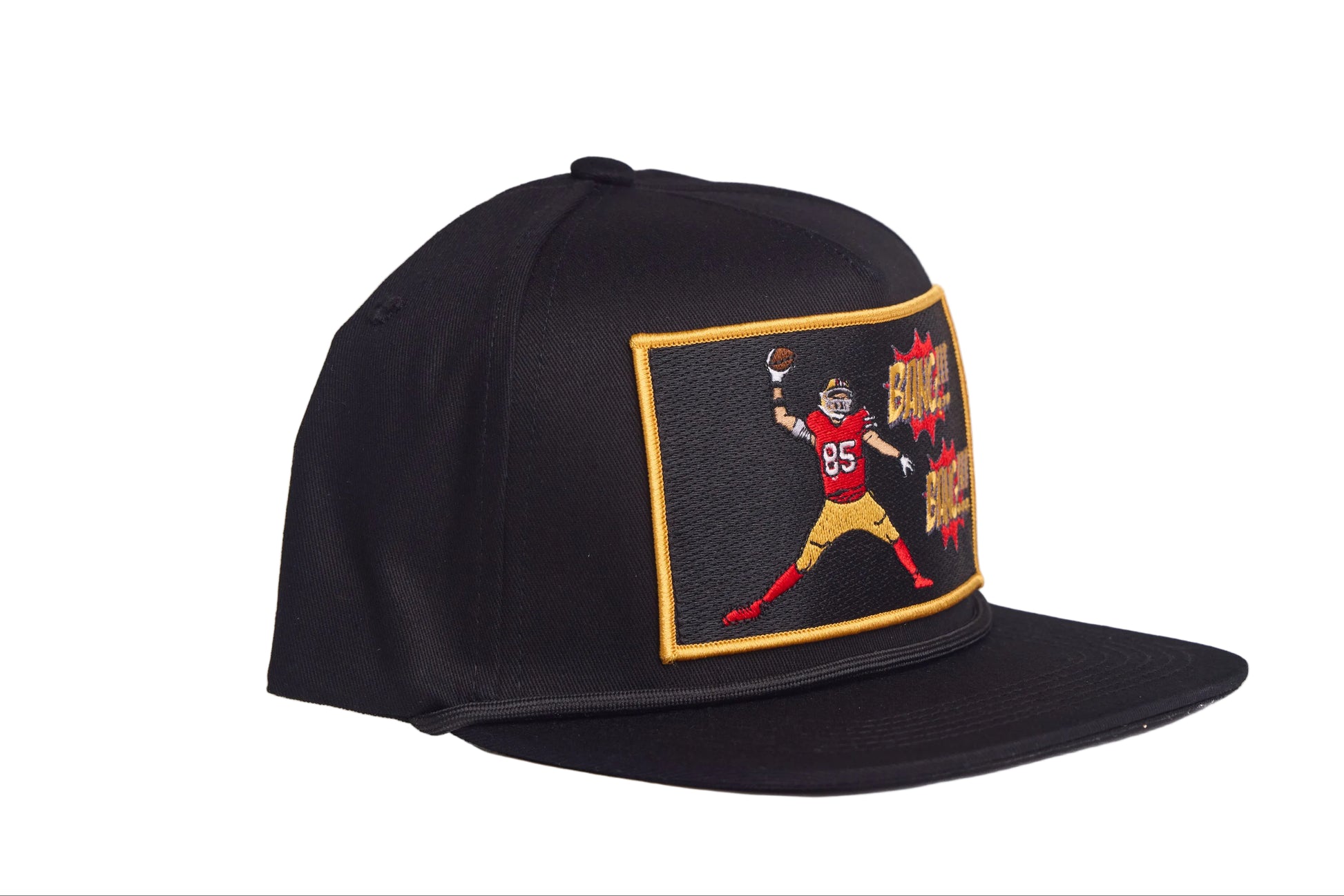 Black hat with George Kittle spiking a football with a Bang Bang 