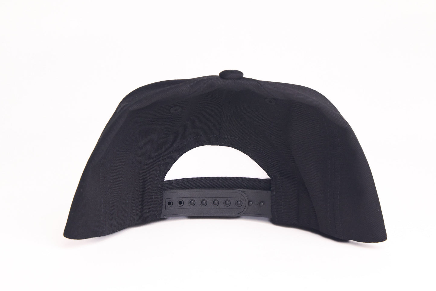 Black flat-bill hat with George Kittle spiking a football patch