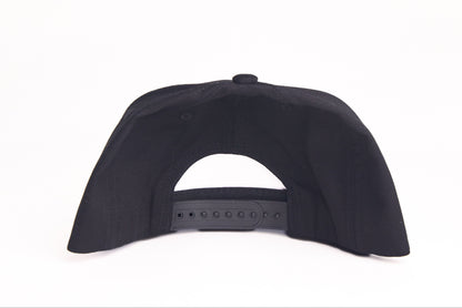 Black flat-bill hat with George Kittle spiking a football patch