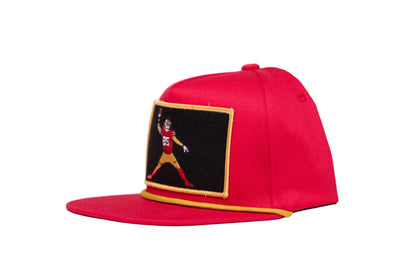 Red flat-bill hat with George Kittle spiking a football patch