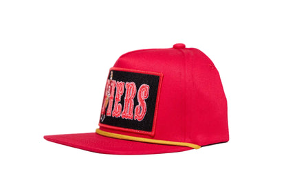 Red flat-bill hat with Brock Purdy Niners design patch