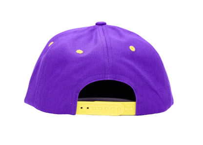 A purple snapback cap shown from the back, featuring yellow embroidered dots on the crown and a yellow adjustable closure strap, set against a plain white background.