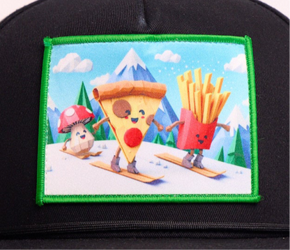 Black flat billed hat with a surreal image of a skiing troupe of Pizza, French Fries, and a mushroom