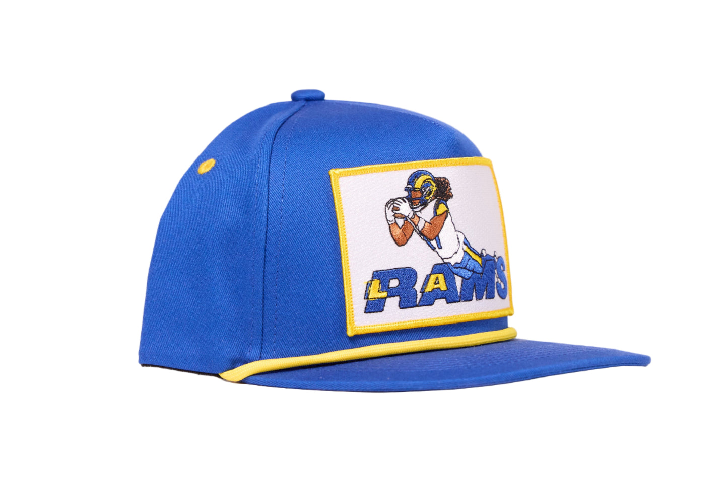 Blue cap depicting Puka Nacua diving for a football for Los Angeles