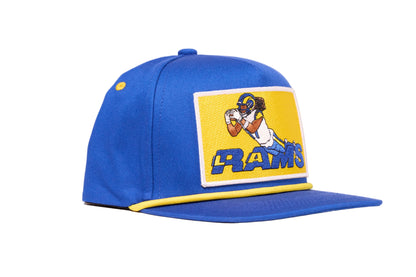 Blue cap depicting Puka Nacua diving for a football for Los Angeles