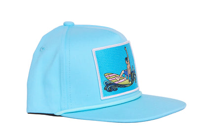 Turquoise hat with a surfing man patch design