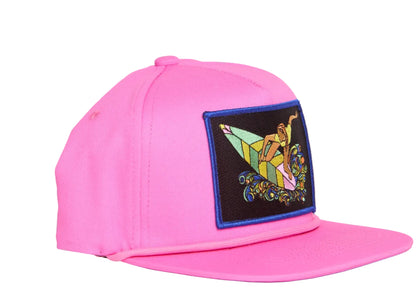 Pink hat with a patch featuring a colorful design of a woman surfing