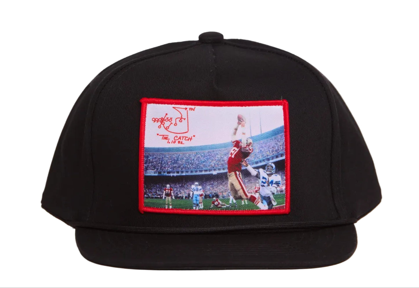 Black hat featuring a photographic patch with an image of The Catch, the legendary touchdown caught by Dwight Clark of the 49ers