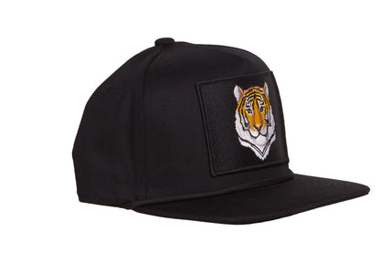 Black hat featuring closeup tiger face design patch