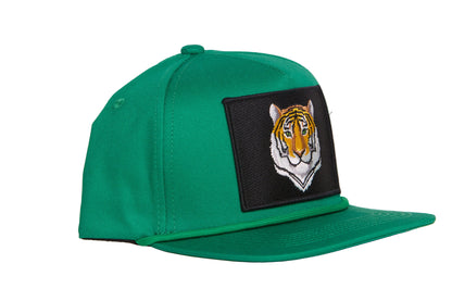 Green hat featuring closeup tiger face design patch