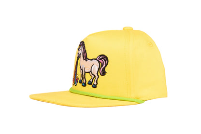 Yellow cap with an embroidered design of a unicorn barfing a rainbow 