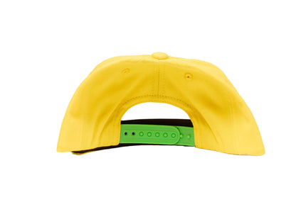 Yellow cap with an embroidered design of a unicorn barfing a rainbow 
