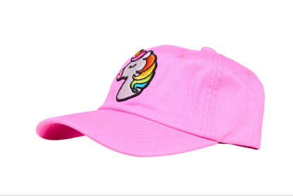 Light pink dad hat with an embroidered unicorn design