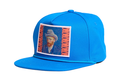 Blue flat-bill hat featuring a patch of Vincent Van Gogh's self portrait in grey felt hat