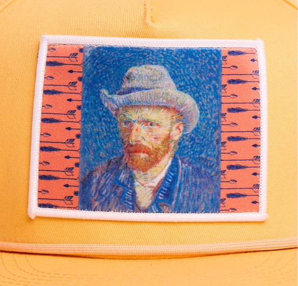 Orange flat-bill hat featuring a patch of Vincent Van Gogh's self portrait in grey felt hat