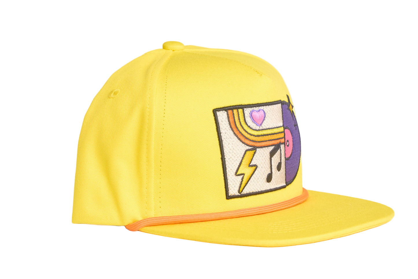 Yellow flat-bill hat with colorful embroidered graphic depicting a vinyl record album with a heart, lightning bolt, and music note