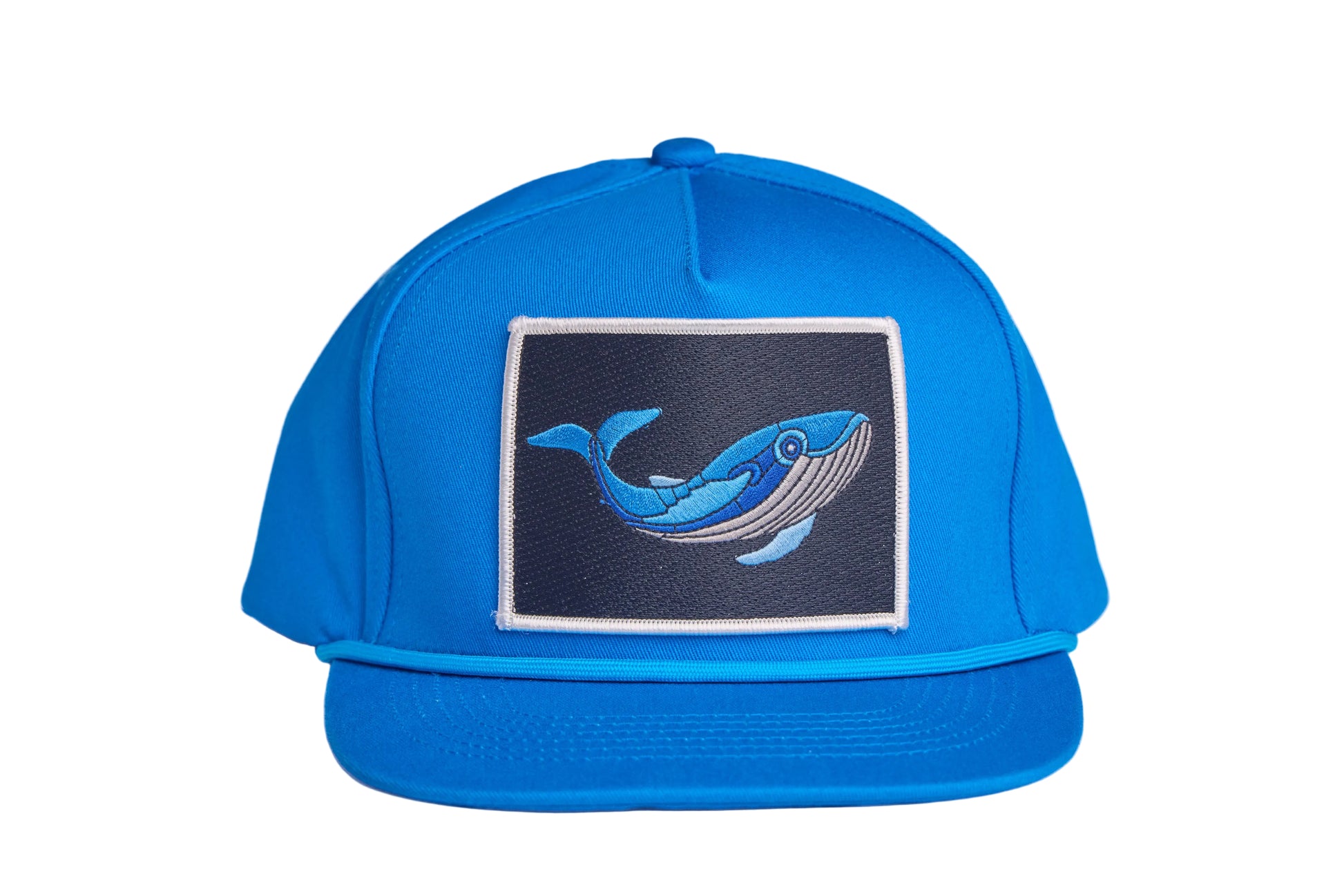 Blue flat-bill hat with a whale patch