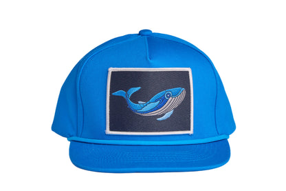 Blue flat-bill hat with a whale patch