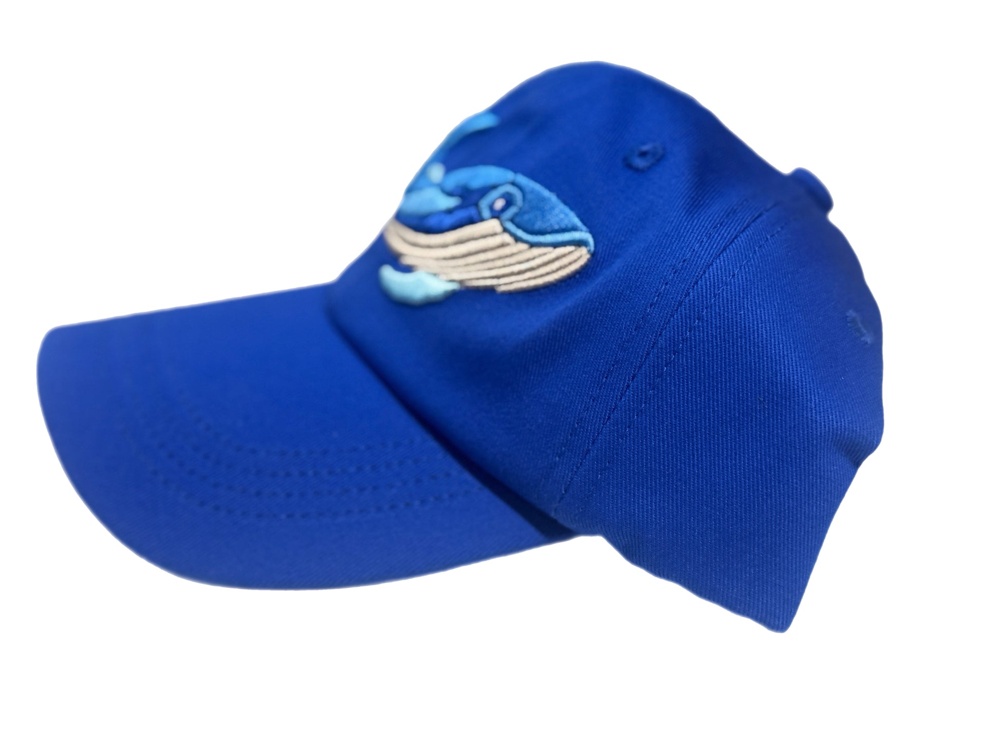 Blue youth-size dad hat featuring a 3-D embroidered whale